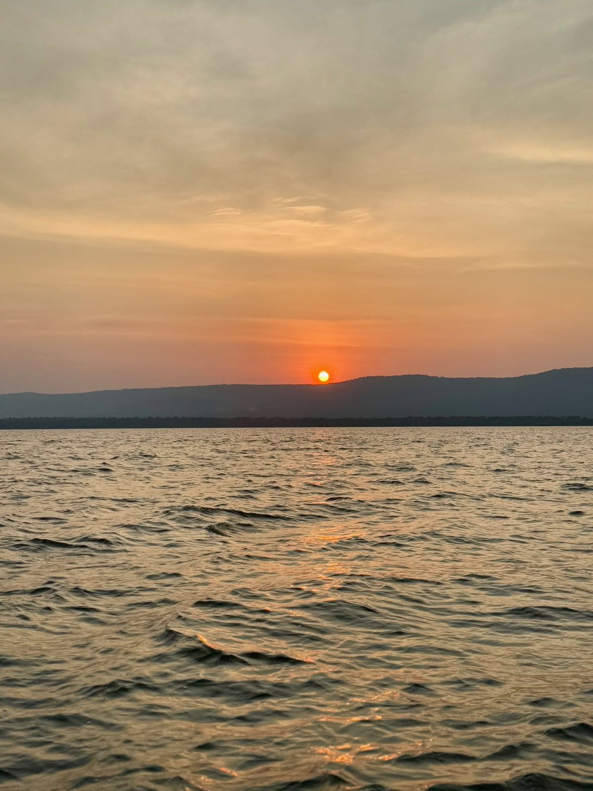 Sunset over the water in Rwanda