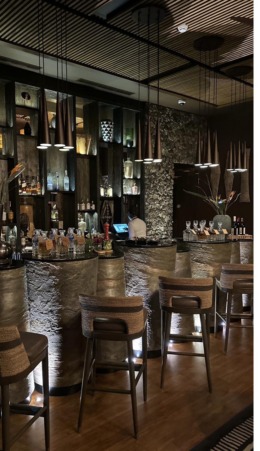 Luxury lodge interior bar Rwanda — Amarembo or One&Only style